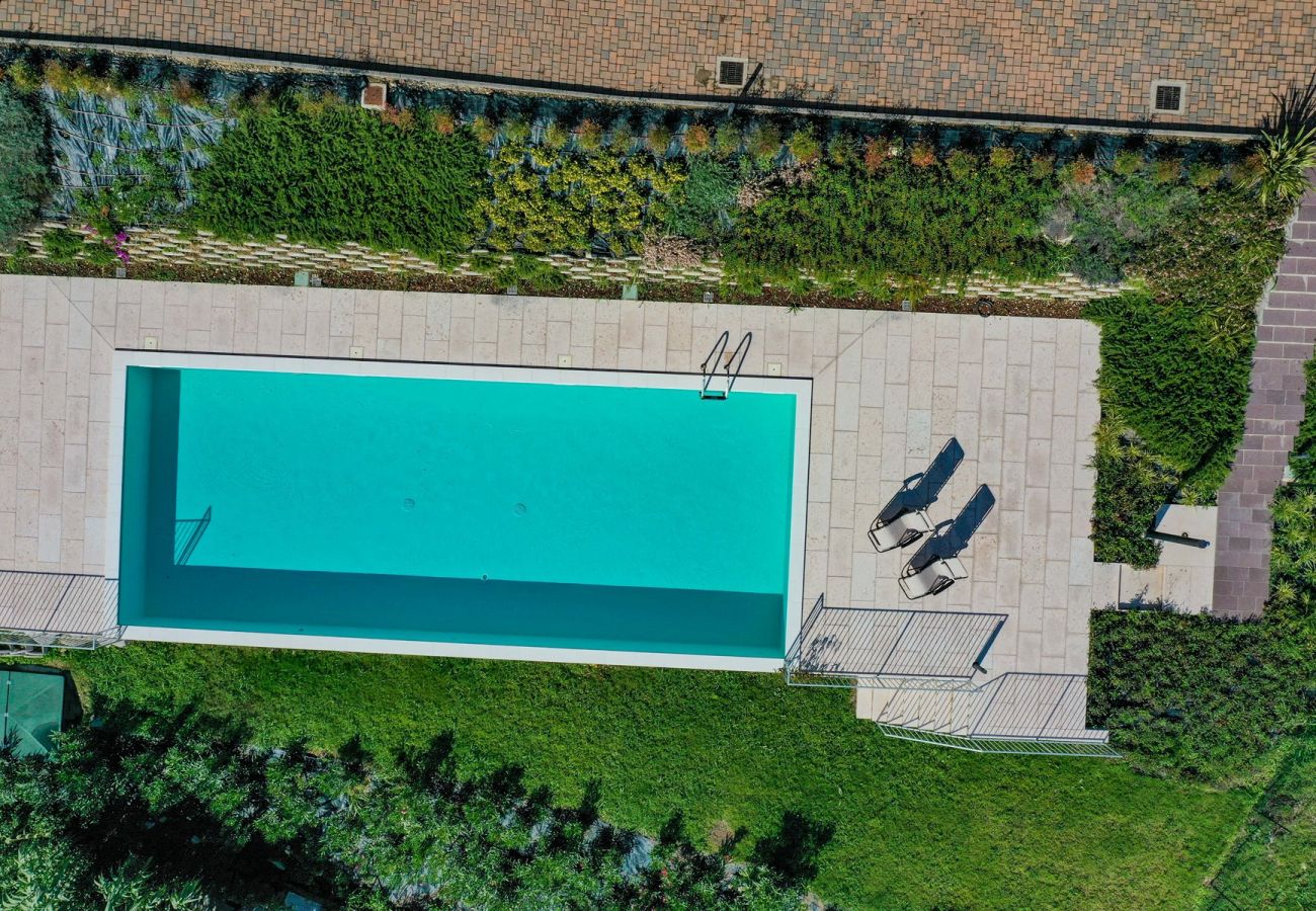 Ferienwohnung in Polpenazze del Garda - Pegaso: mit Balkon mit Seeblick, Pool und Garage