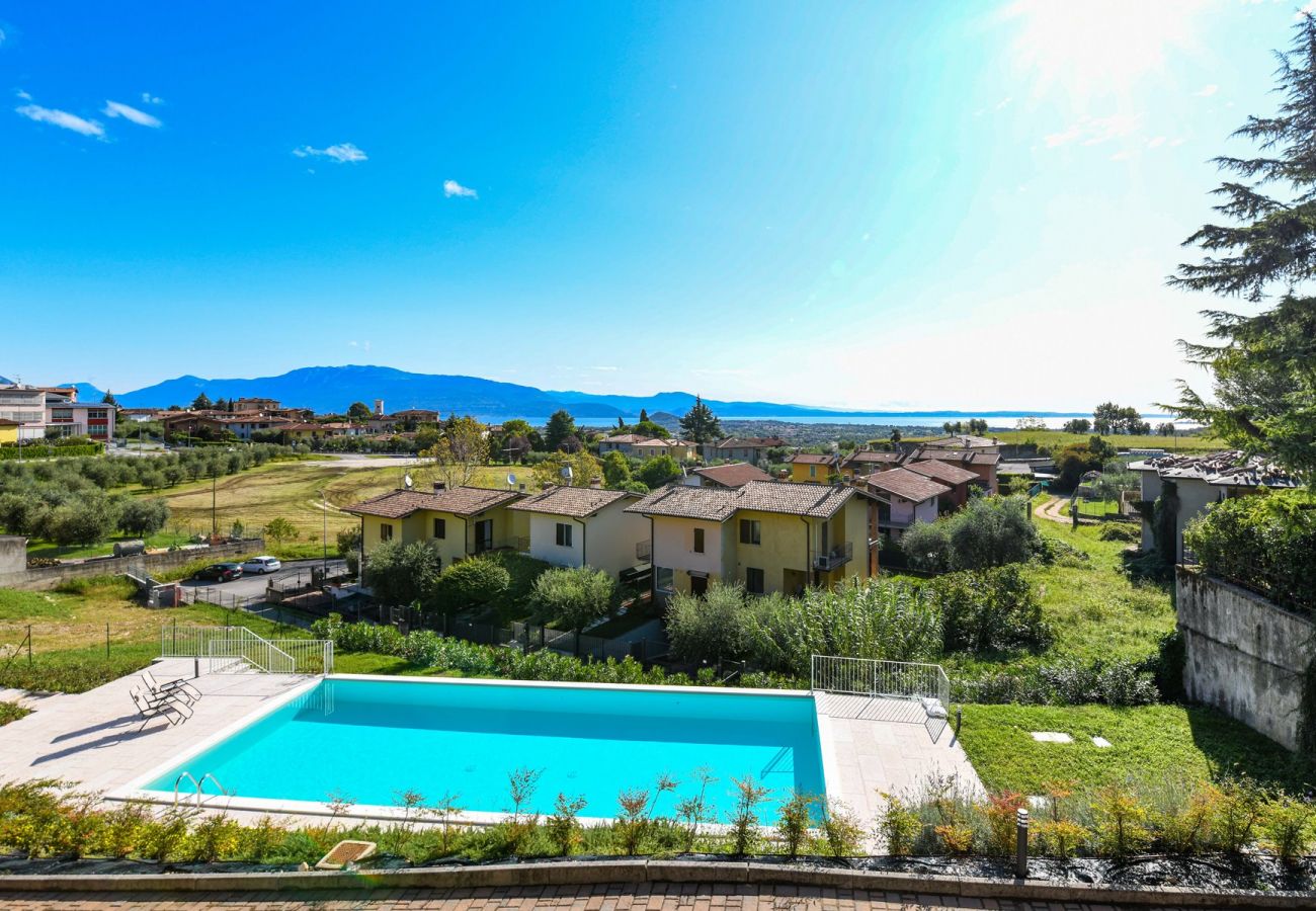 Ferienwohnung in Polpenazze del Garda - Pegaso: mit Balkon mit Seeblick, Pool und Garage